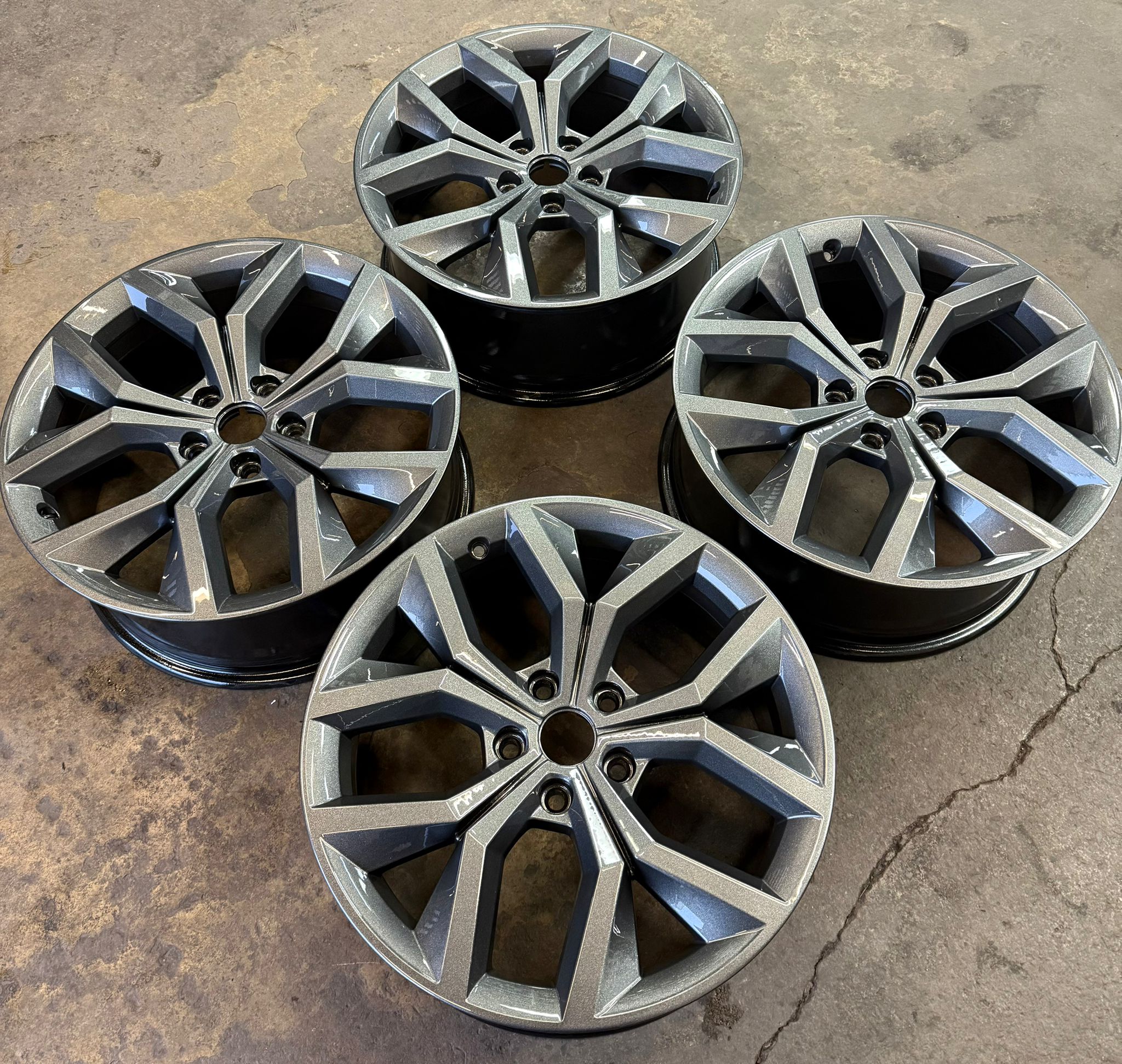 A full set of alloys powder-coated in a fresh anthracite — Burnley