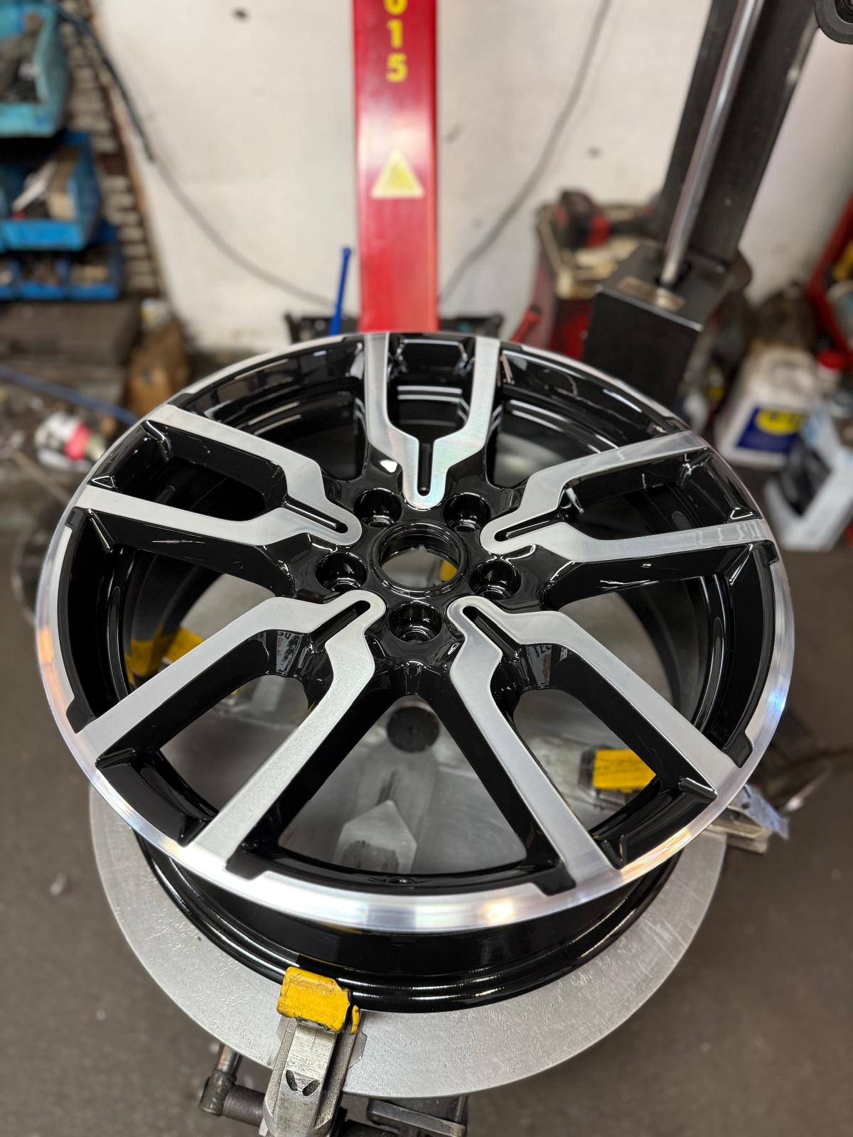 5-spoke alloy diamond cut to a bright machined face with gloss black inlays — Burnley