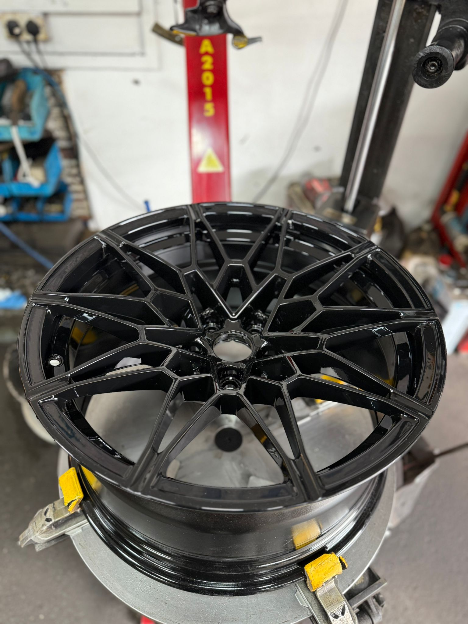 Performance alloy powder-coated in a deep gloss black — Burnley