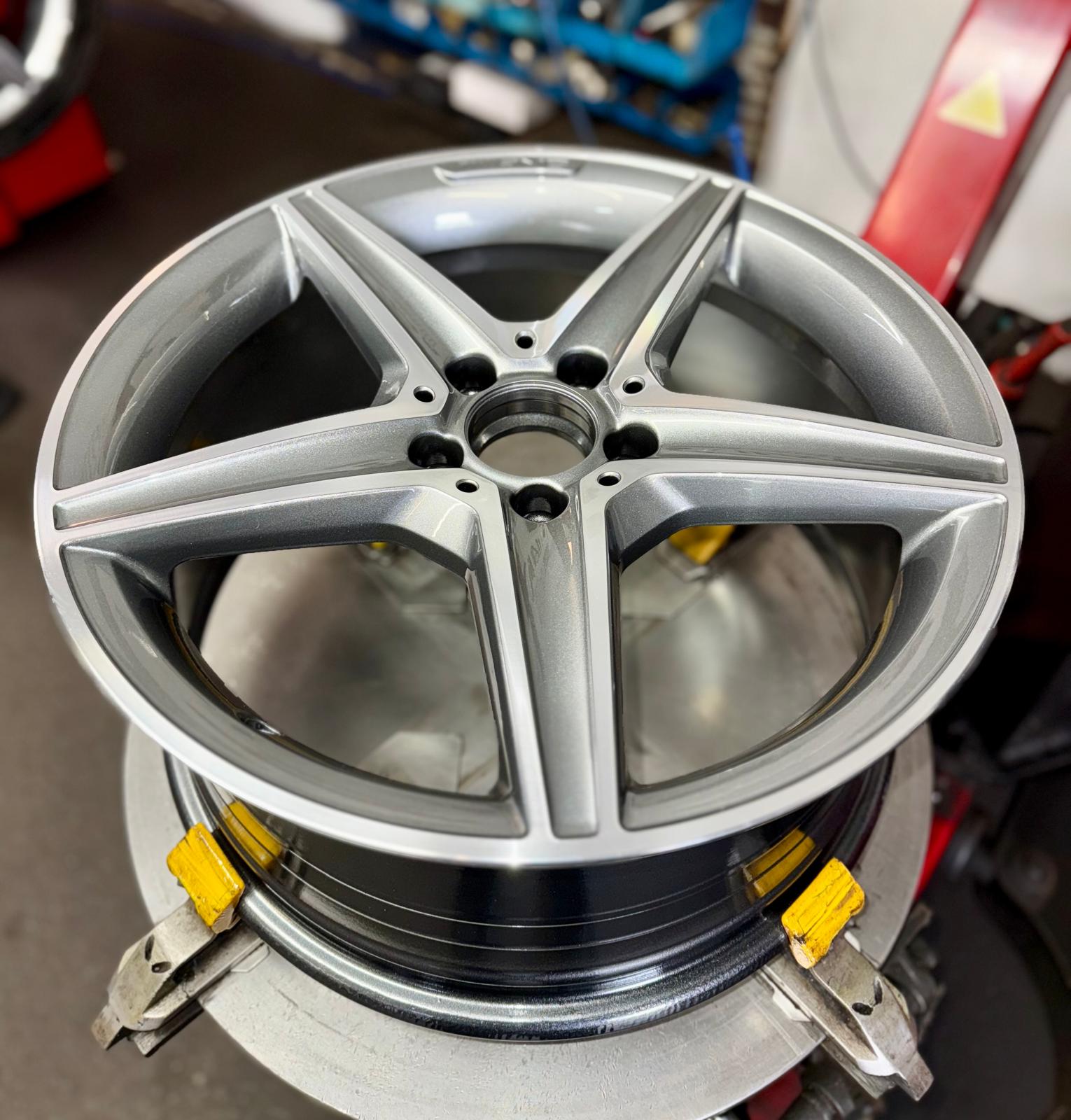 Mercedes-AMG 5-spoke alloy refinished in a diamond-cut silver — Burnley