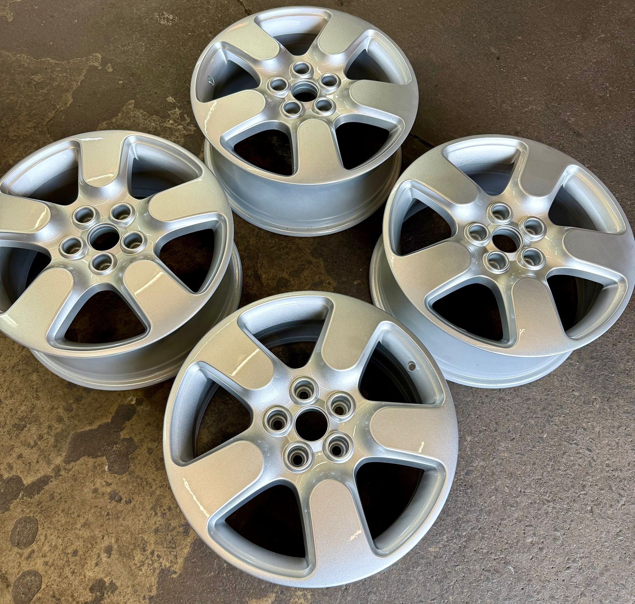 A set of alloys powder-coated in a clean factory silver — Burnley